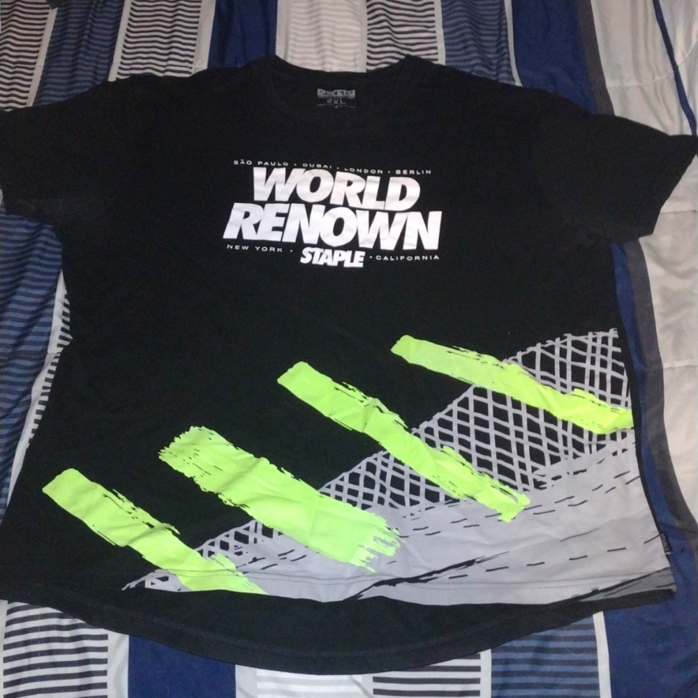 World renowned Staples t-shirt black with lime green, gray and white design